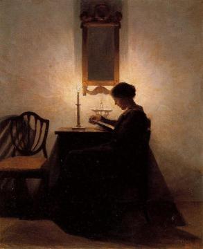 Woman Reading By Candlelight Artwork by Peter Ilsted