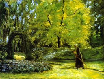The Circular Bed in the Hedge Garden with a Woman Watering flowers Artwork by Max Liebermann