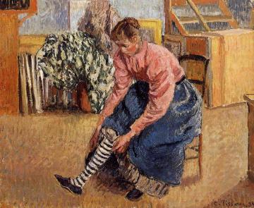 Woman Putting on Her Stockings Artwork by Camille Pissarro