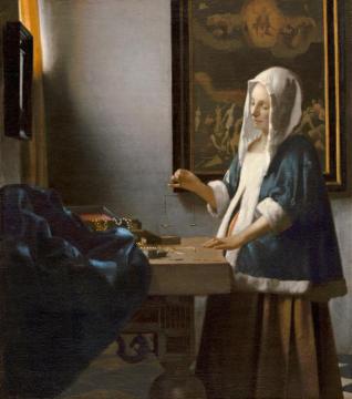 Woman Holding A Balance Artwork by Johannes Vermeer